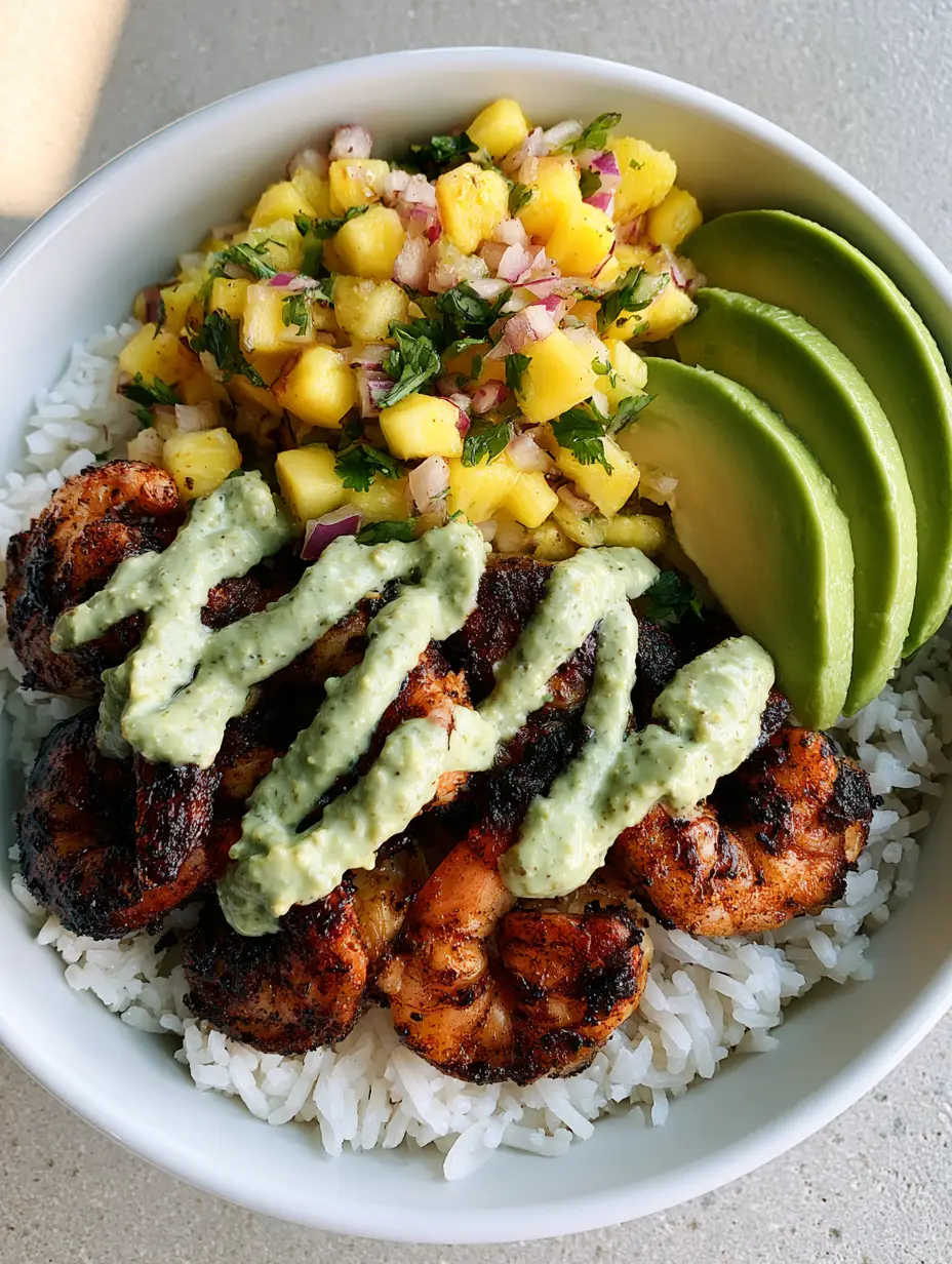 A handheld smartphone photo of a Shrimp Rice Bowl with Pineapple Salsa in a white bowl showing charred shrimp and bright fruit salsa.